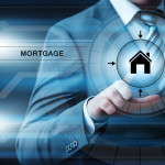 Man pressing mortgage button