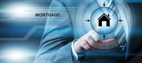 Man pressing mortgage button